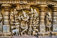 Panel showing Krishna playing the flute 