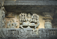 Chennakeshava temple, Beluru, Lord Shiva with multiple arms holding a weapon in each hand