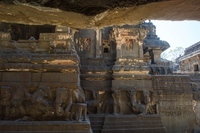 Row of elephants and lion with the Mahabharata relief panel on the right at Kailasanath in Ellora