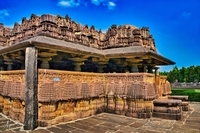 Below the parapet wall - beautifully carved miniature towers, Carving on the parapet wall - sequences from the epic Ramayana - Kishkinda kanda - Rama's meeting with Sugreeva