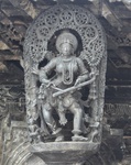 Chennakeshava temple, Beluru, Madanika - playing a musical instrument