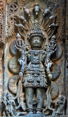 Vishnu with Sheshanaga - the seven-hooded serpent - 96
