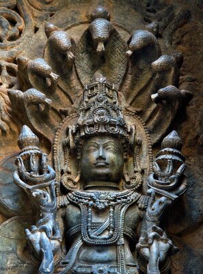 Vishnu with Sheshanaga - the seven-hooded serpent - 97