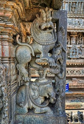 Chennakeshava temple, Beluru, Man atop an elephant fights a tiger, p30