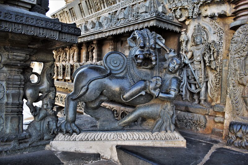 Chennakeshava temple, Beluru, Hoysala symbol of a man named Sala slaying a lion,  to the left of the main door