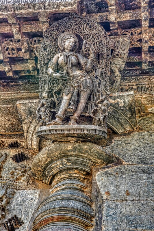 Chennakeshava temple, Beluru, A madanika looking at herself in a mirror, p38