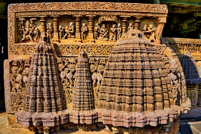Carving on the parapet wall - sequences from the epic Ramayana - Seeta in Ashokavana, Below the parapet - carved miniatures of temple towers