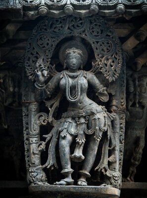 Chennakeshava temple, Beluru, Shilabalike, Madanika - gathering fruits/plucking a mango