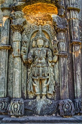 Chennakeshava temple, Beluru, Life-size sculptures of Gods and Goddesses on the external wall, p23